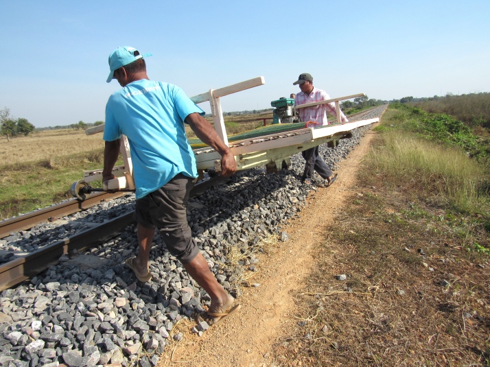 Lifting the bamboo train onto the track